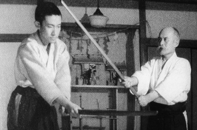 Aikido Founder training his son